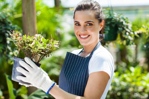 Gardener using tools for lawn care